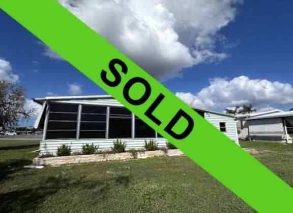 Ellenton, FL Mobile Home for Sale located at 7703 Lakeshore Dr Colony Cove